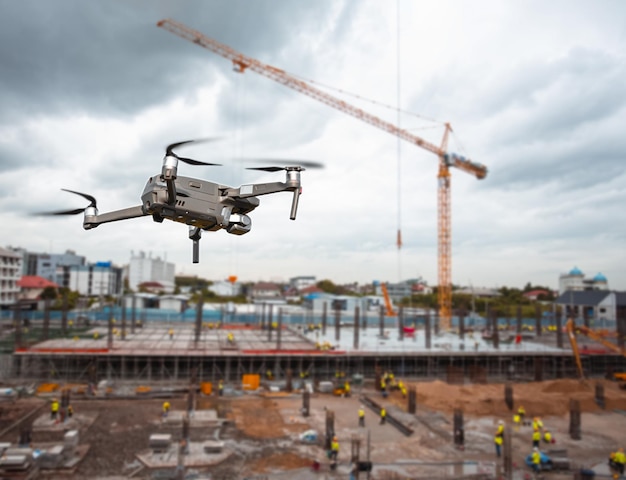Drone over construction site video surveillance or industrial inspectionx9