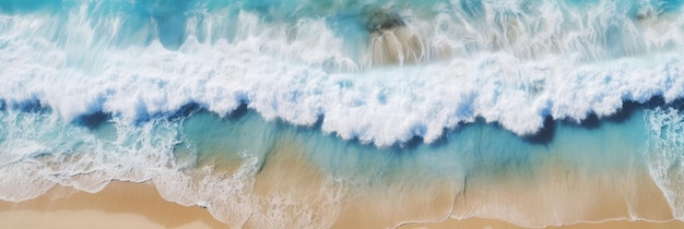 Drone perspective overlooking the clean and beautiful beach and waves