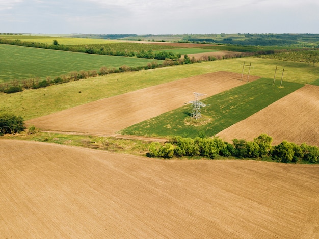 Drone photo of cereal farm land during spring time