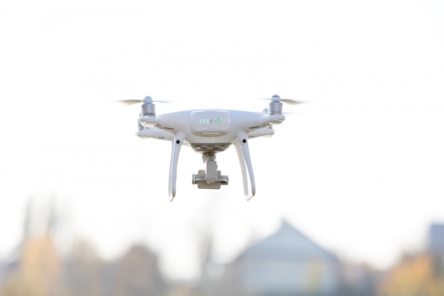 Drone quad copter on green corn field