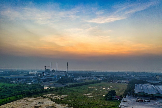 Drone Shot of an Industrial Area During Sunrise Photo