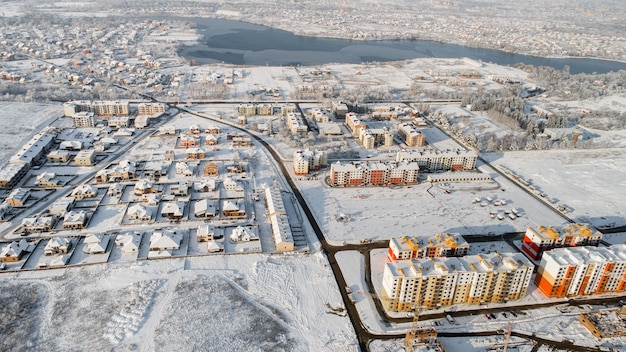 Drone view of a city covered by snow