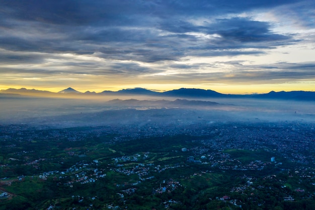 Drone view of foggy Puncak Pass in the morning