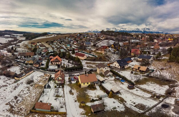 Drone view of Ganovce village with the view of High Tatras