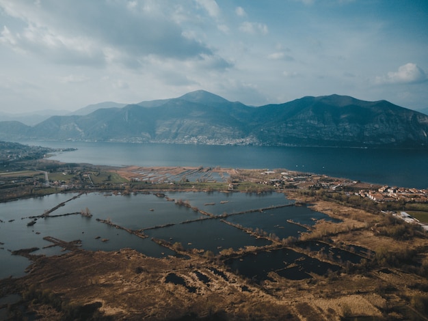 Drone view of a lake and mountains landscape