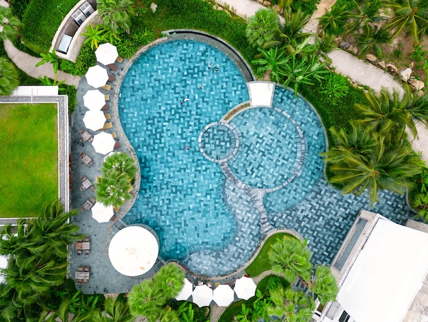 drone view luxury resort swimming pool aerial shot