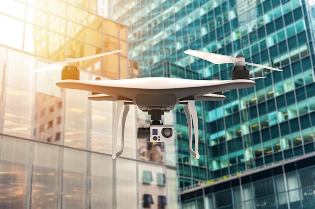 Drone with digital camera flying over a modern city