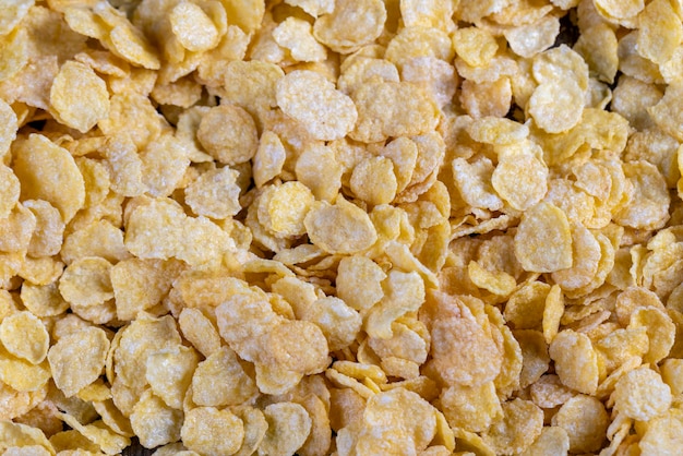 Droog ontbijt cornflakes van gele kleur close-up