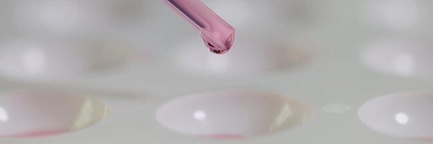 A drop is dripping from a red pipette into a container for laboratory research a closeup