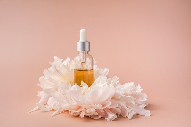 Drop oil serum collagen moisturizer for face soft light background