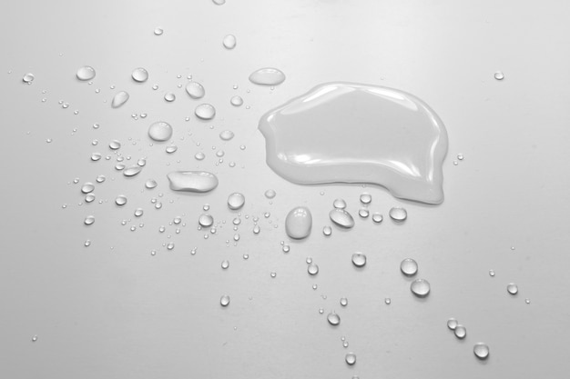 Drop of water on white background