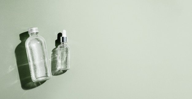 Фото Капельница в стеклянной бутылке, макет, уход за телом и спа, натуральные косметические продукты, эко-крем-сыворотка для ухода за кожей ...