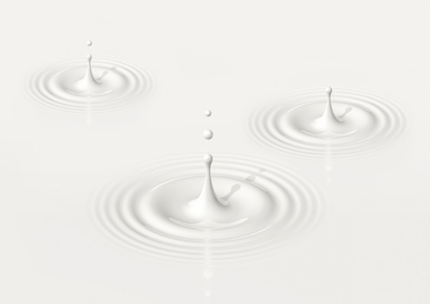 Drops of milk splashing and making ripple