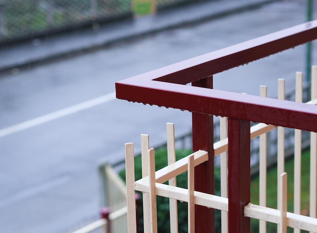 Drops of rain on railing