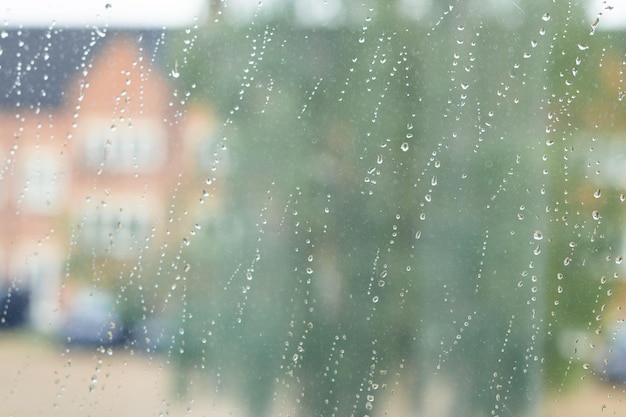 Drops of rain on the window wet weather