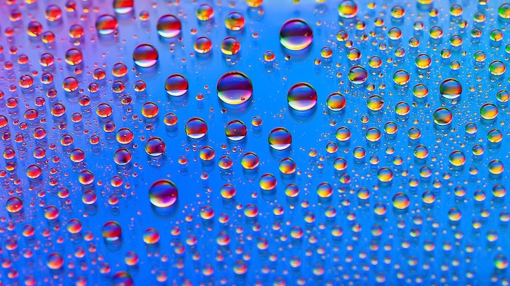 Фотография капли воды абстрактный градиентный фон текстура капель радужный градиент сильно текстурированный