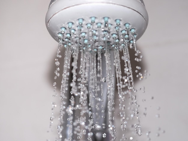 Photo drops of water from shower head