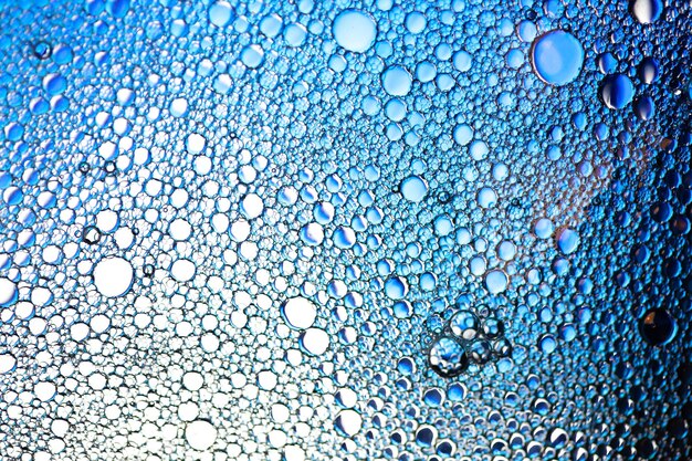 Drops of water on the glass. background for design