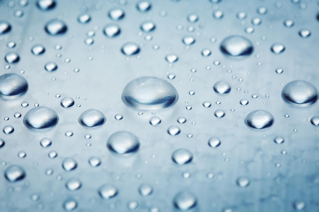 Photo drops of water on a light surface close.macro water drop.