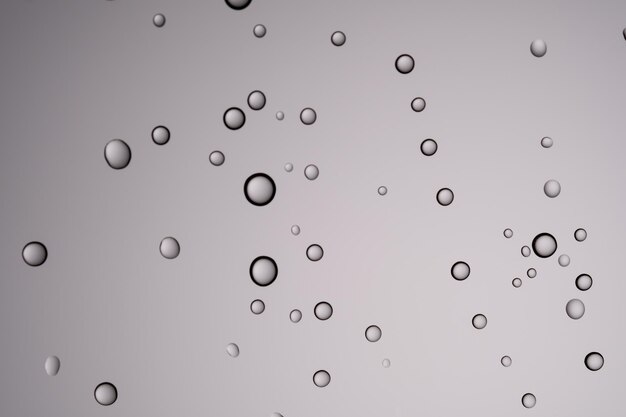 Drops of water on a transparent gray background