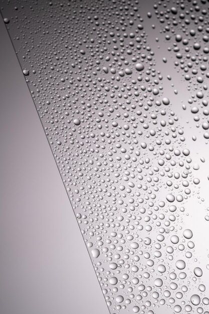 Drops of water on a transparent gray background