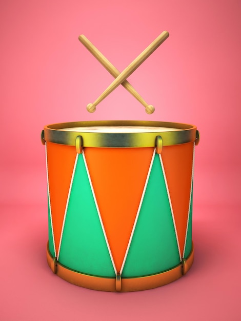 Drum and drumsticks on pink background