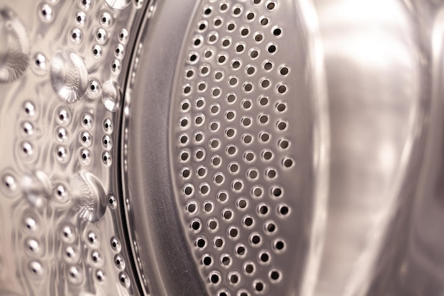 Drum of washing machine dry and clean closeup Washing Dryer Machine inside view of a drum