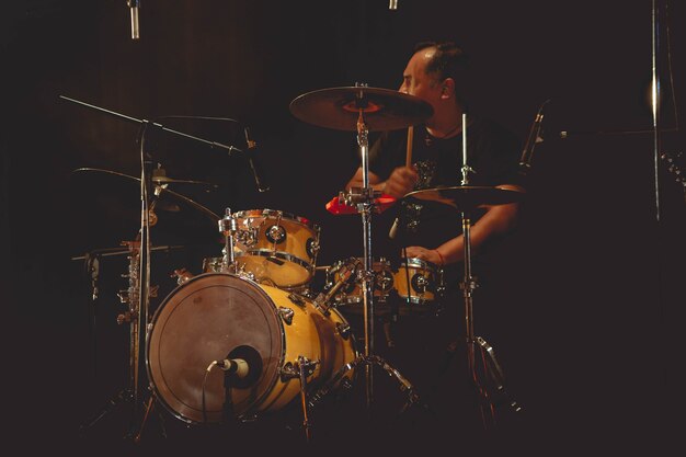 Drummer at stage with small drum