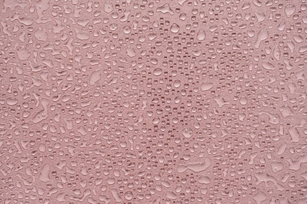 Druppels splatter patroon op neutrale roze achtergrond Minimalistische schoonheid sjabloon