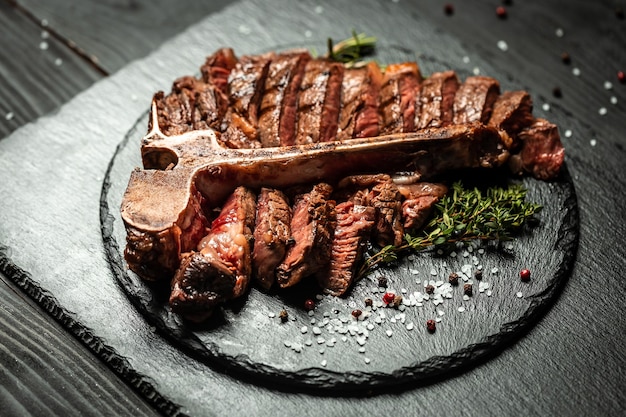 Dry Aged Barbecue Porterhouse Steak grilled beef steak with spices served