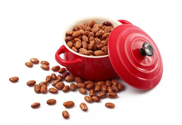 Dry beans in pot in white background