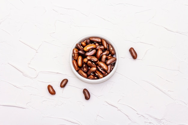 Dry brown bean or kidney bean in glass jar. A valuable source of protein for a healthy vegan diet. 