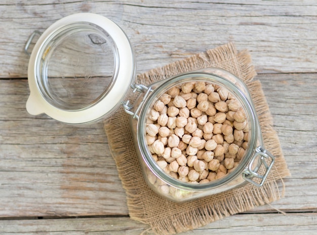 Dry Chickpea in a glass jar top view