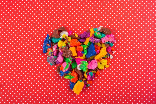 Dry colorful play dough in heart shape