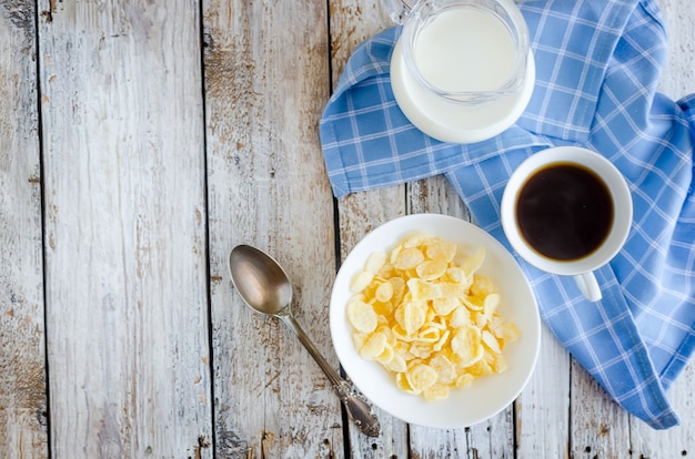 Dry corn flakes in white plate