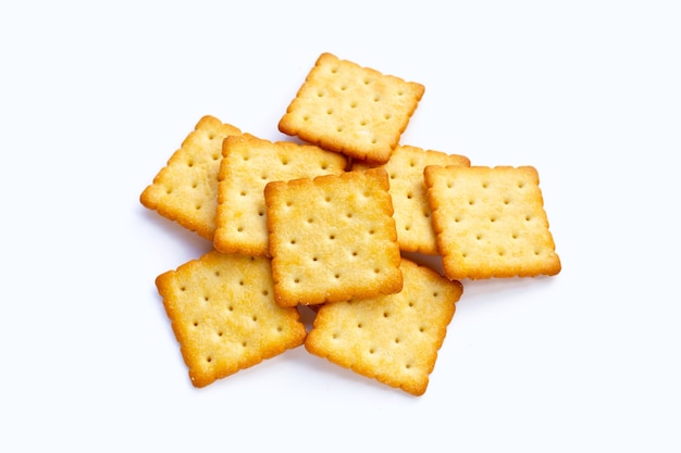 Dry cracker cookies on white background.