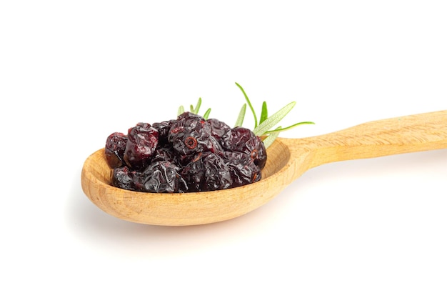 Dry Cranberry Pile Isolated Dried Lingonberry Berries in Wood Spoon Cowberry Natural Dessert Healthy Diet Organic Snack Dry Cranberries on White Background Top View