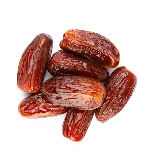 Premium Photo | Dry dates isolated on white background top view flat ...