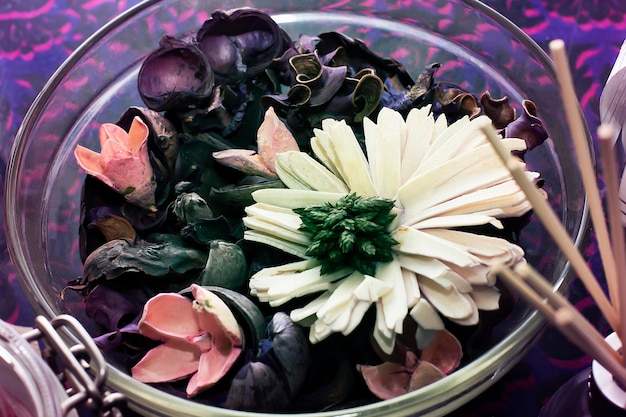 Dry and floral tea set in a bowl