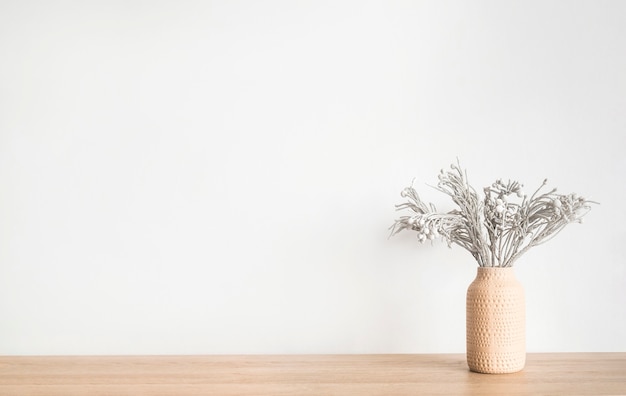 dry flowers plant floral  in a vase  table against white wall minimalistic scandinavian