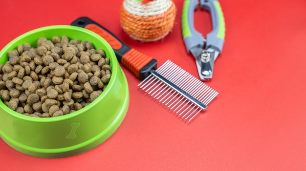 Dry food in bowls leashes for dog or cat