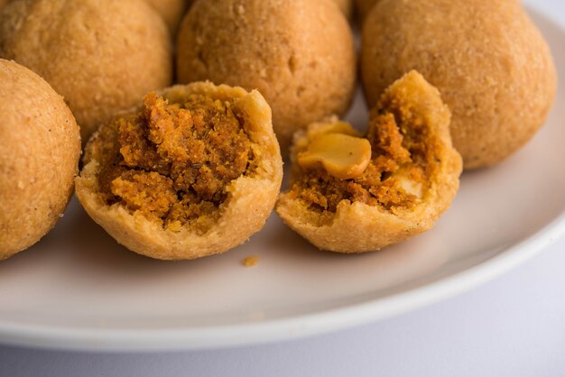 Dry fruit Kachori is small and round shape ball stuffed with masala and cashew etc, served with tomato ketchup and hot tea, Haldiram product