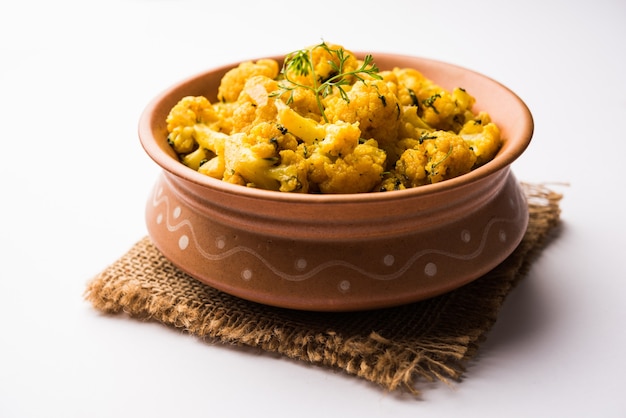 Dry Gobi Masala or cauliflower Sabzi served in a bowl. selective focus