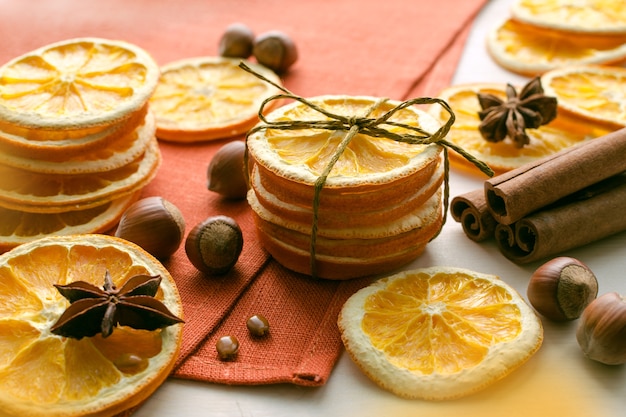 Dry orange slices and candle