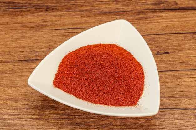 Dry paprika powder in the bowl