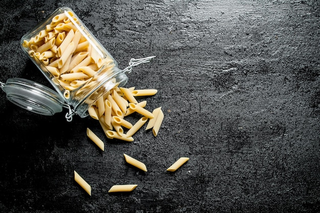 Dry pasta in a glass jar