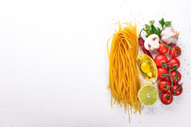 Dry Pasta on a wooden background Italian Traditional Cuisine Top view Copy space