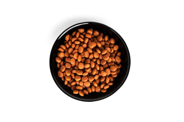 Dry pet food isolated on a white background. Bowl with cat food isolated. High quality photo