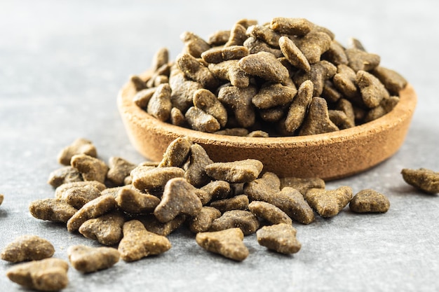 Dry pet food Kibble dog or cat food in bowl