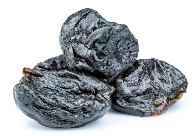 Dry prunes isolated on white background